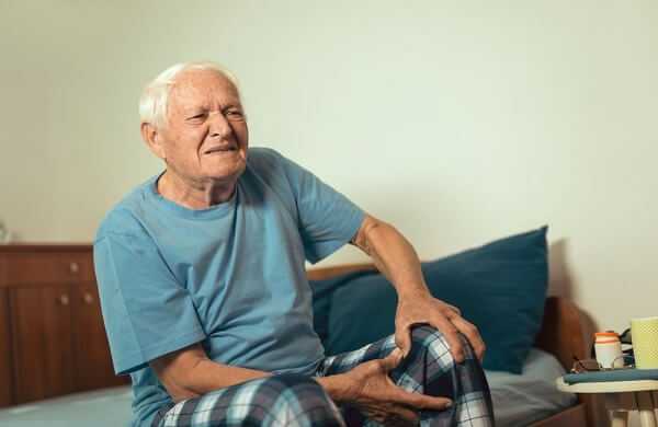 Senior man with osteoarthritis pain in the knee