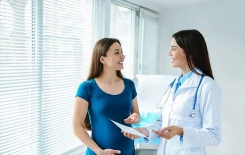 Happy Pregnant Woman Visit Gynecologist Doctor 