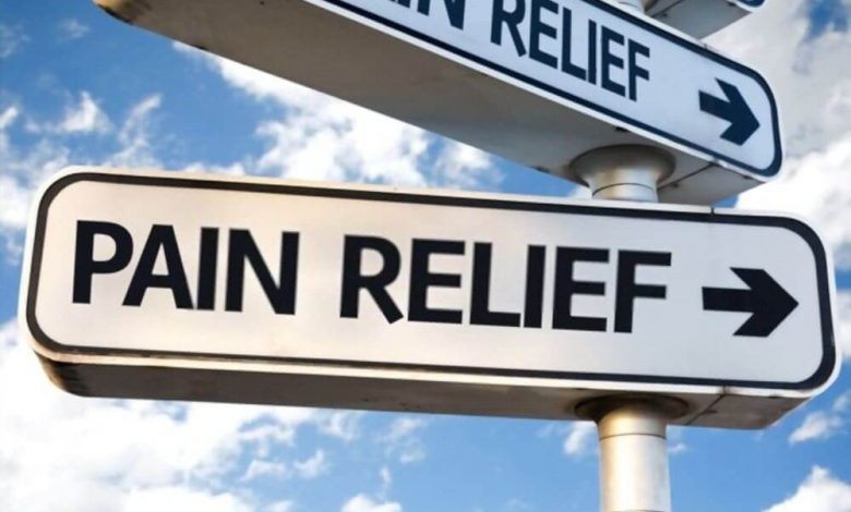 pain relief direction sign on sky